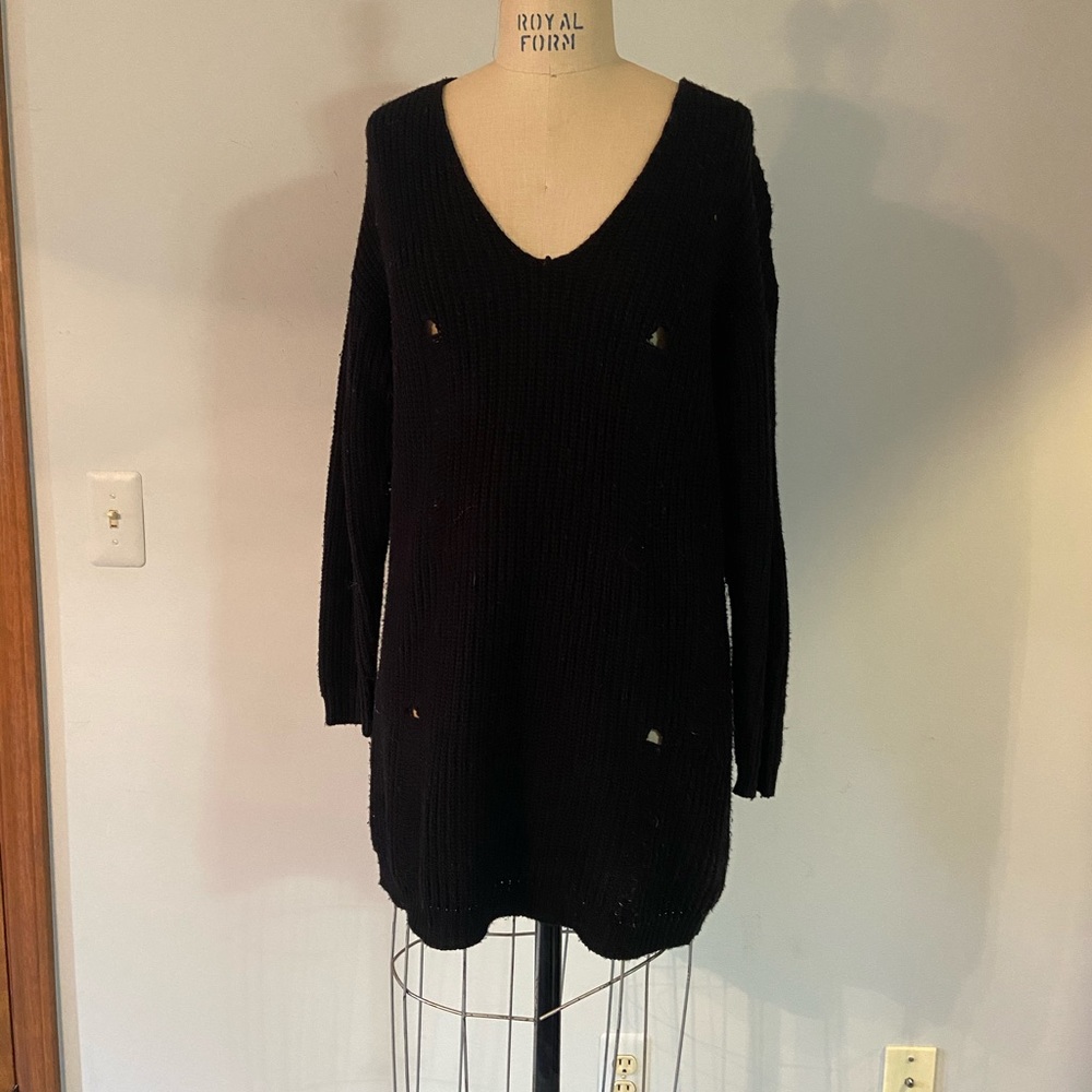 Black oversized sweater with distressed details